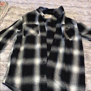 A men’s black and white flannel